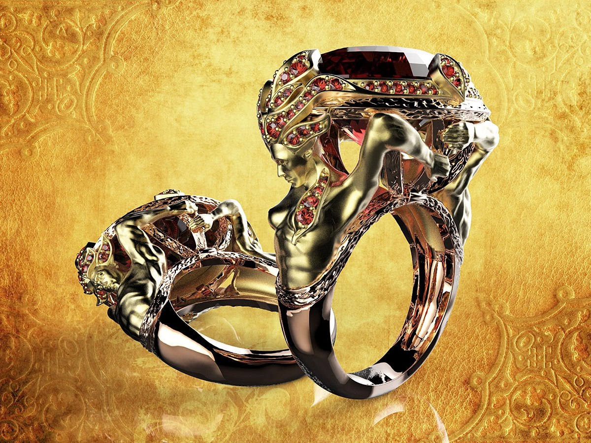 Кольцо матованое двухсплавное эксклюзивное в стиле модерн. в виде мужчины иженщины с крупным рубином.